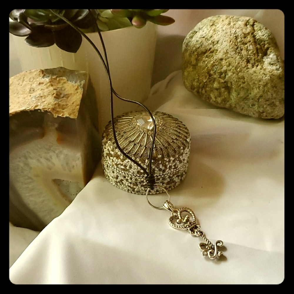 Leather necklace with beautiful charm